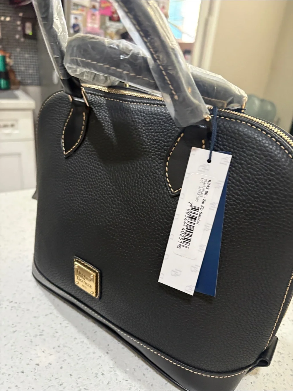 Dooney & Bourke structured dome